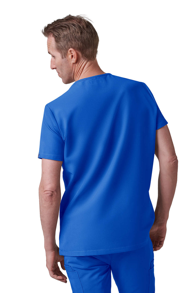 Man wearing MedTailor men's scrub top in Royal Blue color fabric