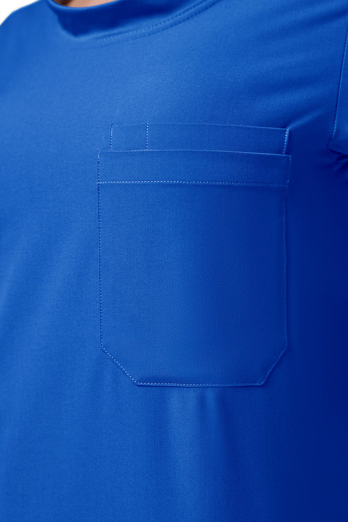Man wearing MedTailor men's scrub top in Royal Blue color fabric