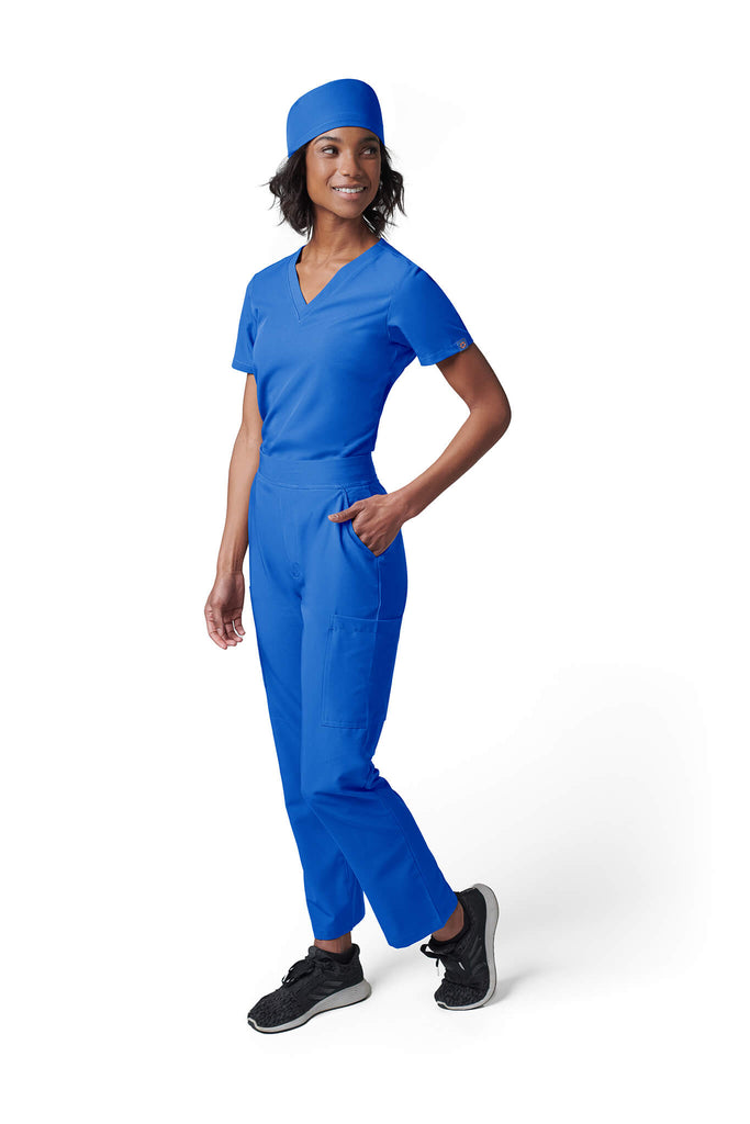 Woman wearing MedTailor women's scrub cap in Royal Blue color fabric