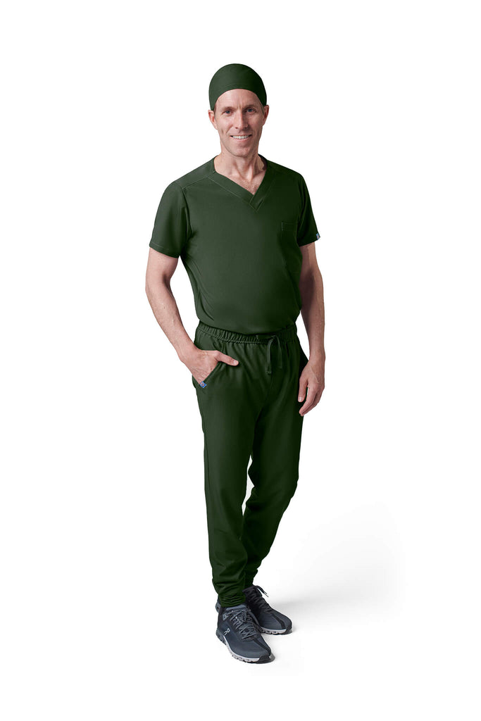 Man wearing MedTailor men's scrub cap in Highland Green color fabric