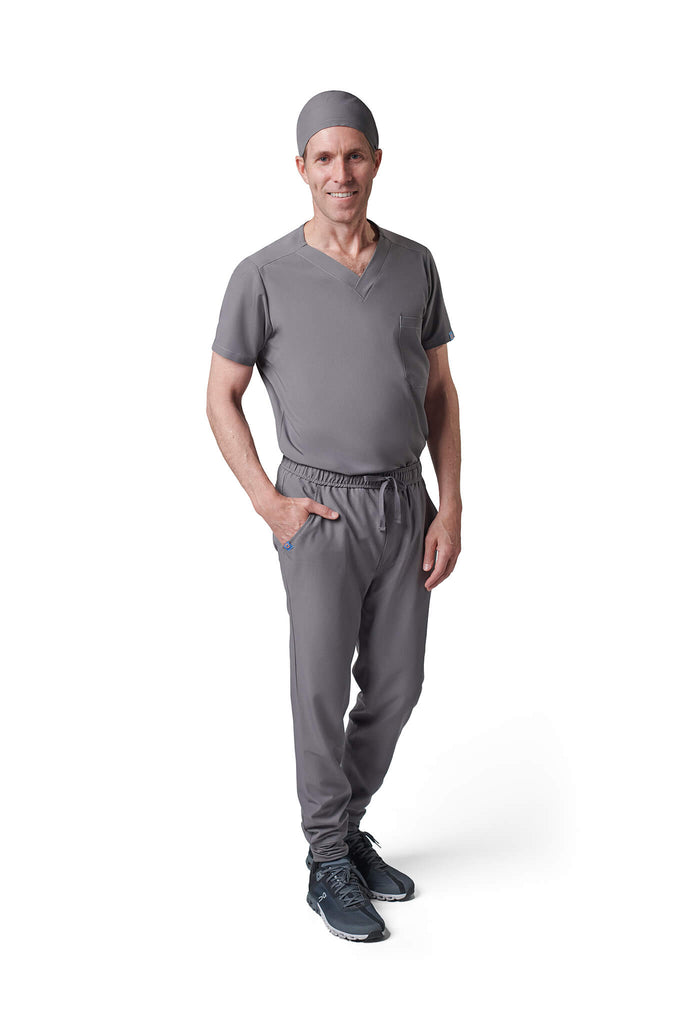 Man wearing MedTailor men's scrub cap in Platinum Gray color fabric