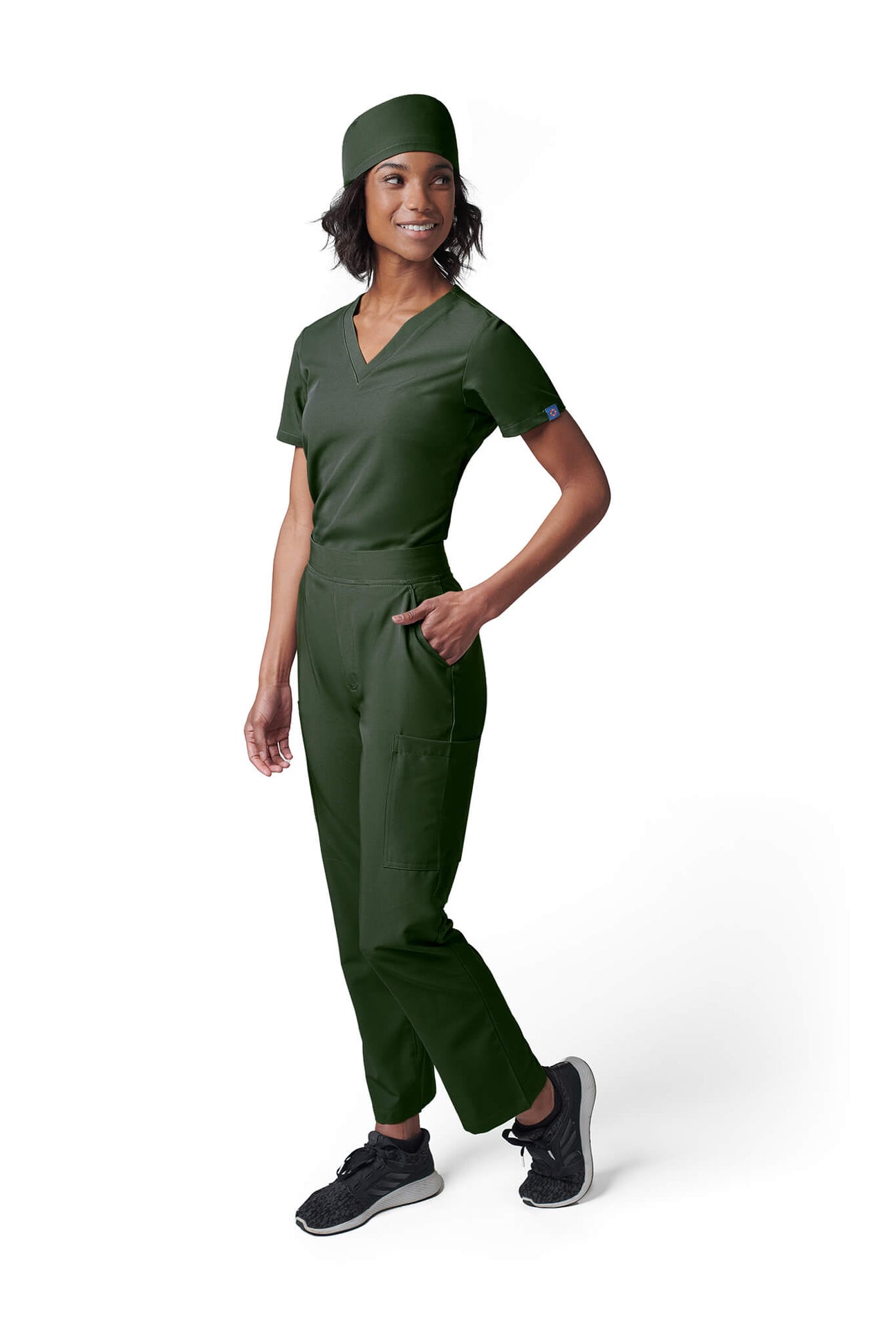 Woman wearing MedTailor women's custom scrub cap in Highland Green color fabric