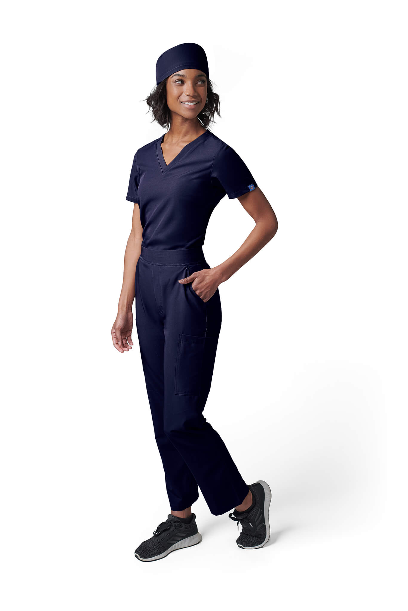 Woman wearing MedTailor women's custom scrub cap in Navy Blue color fabric