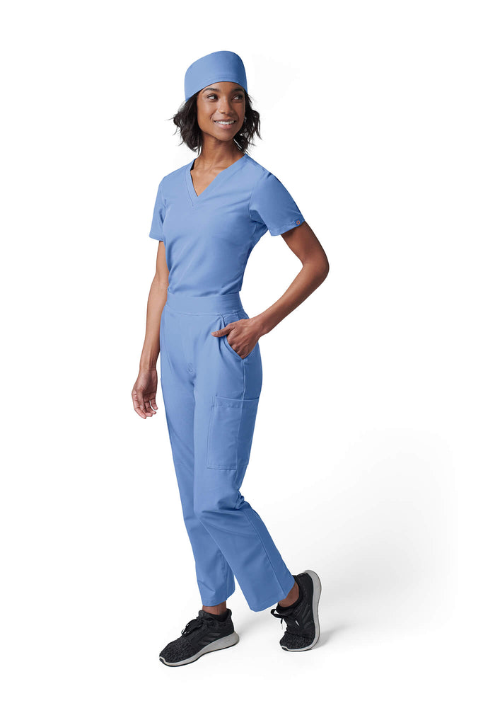 Woman wearing MedTailor women's scrub cap in Sky Blue color fabric